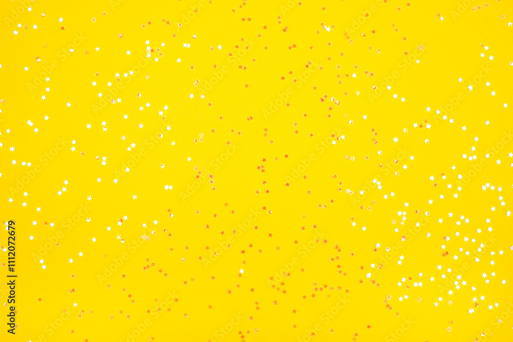 Tiny pearl stars on yellow background. Tiny pearl stars on yellow background.