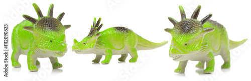 dinosaurs toys on white background photo