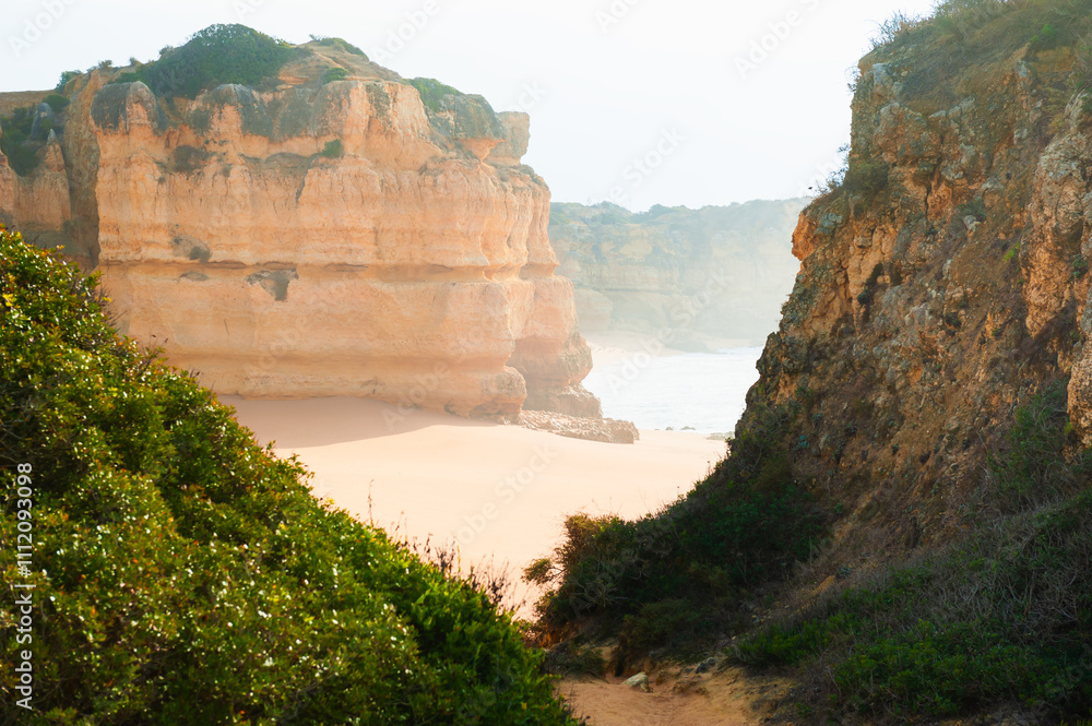 Rocks on the shore of Atlantic ocean in Algarve, Portugal.
