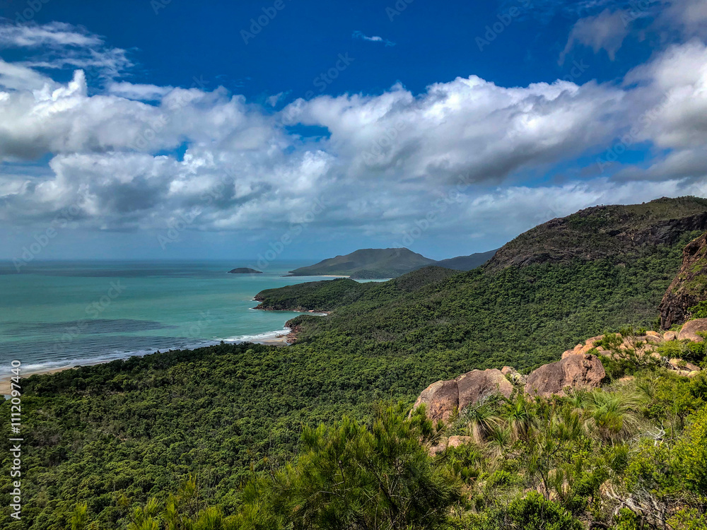 A Stunning Coastal Landscape Featuring Lush Greenery and Beautiful Blue Waters of Nature A Stunning Coastal Landscape Featuring Lush Greenery and Beautiful Blue Waters of Nature