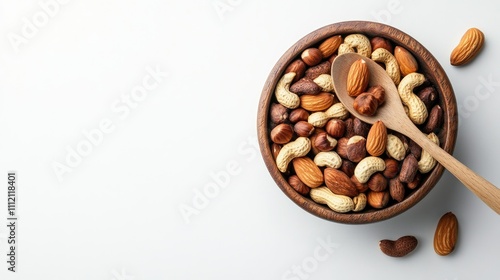 Assorted Nuts in Wooden Bowl with Spoon on Light Background