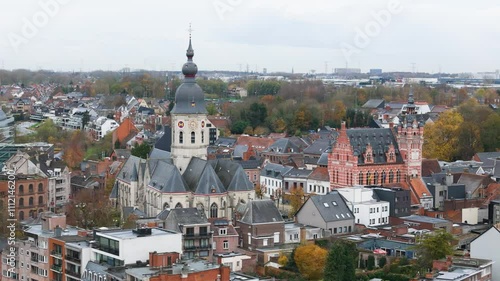 temse belgium town’s church city hall residential areas village circling aerial drone shot view scenic river scheldt urban area european town  photo