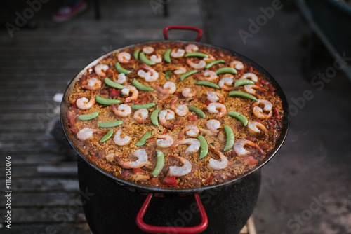 Paella pan with prawns photo