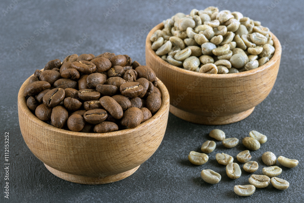 Green coffee with roasted coffee beans on gray background Green coffee with roasted coffee beans on gray background