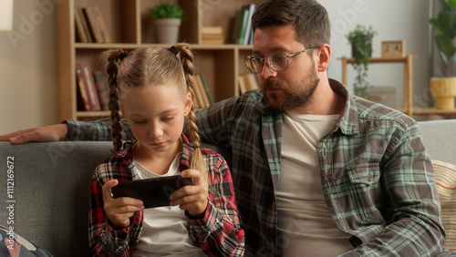 Photography Worried upset Caucasian dad man male daddy touching speak little girl child daug