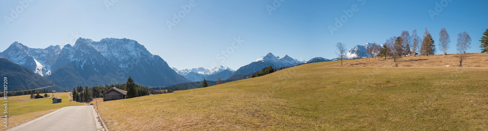 idyllic bike route from Krun to Mittenwald, Karwendel alps, upper bavaria. landscape early springtime idyllic bike route from Krun to Mittenwald, Karwendel alps, upper bavaria. landscape early springtime