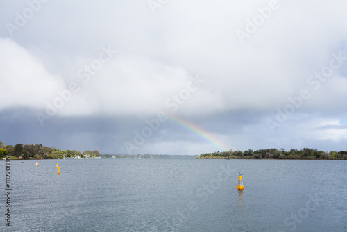 rainbow and riverside views over water of coastal Hastings river in Port Macquarie