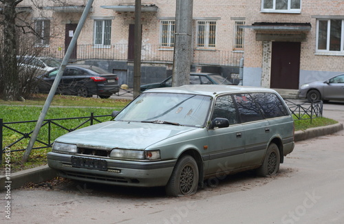 Slika na platnu An old abandoned car is parked in the yard, Iskrovsky Prospekt, Saint Petersburg