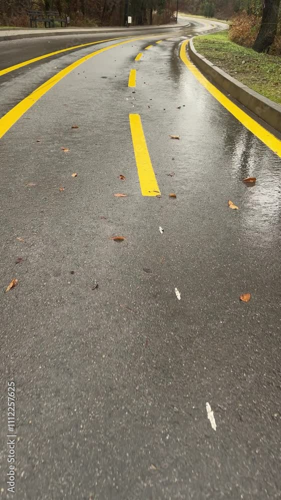 Vertical video road yellow lines rainy day Vertical video road yellow lines rainy day
