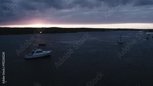 Dark Sky Over Docked Boats: Aerial Shot Before the Storm