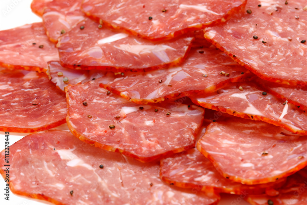A pile of sliced meat on a white surface. A plate of meat and a white snack on a white background. Meat snacks white background slice lies. A white slice of meat lies on a lifestyle plate. A pile of sliced meat on a white surface. A plate of meat and a white snack on a white background. Meat snacks white background slice lies. A white slice of meat lies on a lifestyle plate.