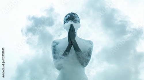 Facing upward, hands in prayer amidst swirling smoke
