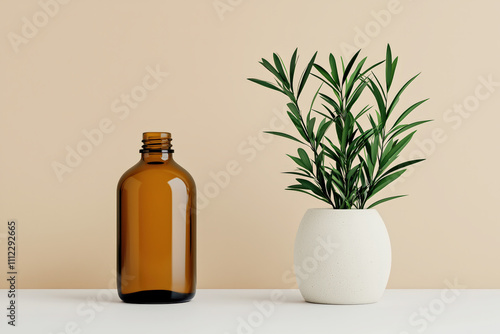 Amber glass wellness oil bottle and plant creating a relaxing vibe