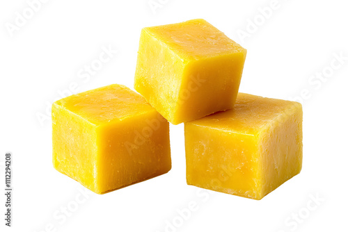 a group of cubes of yellow food