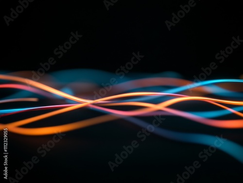 Vibrant beams of blue and orange light intersect with each other, forming an eye-catching composition set against a deep black backdrop, creating a futuristic feel