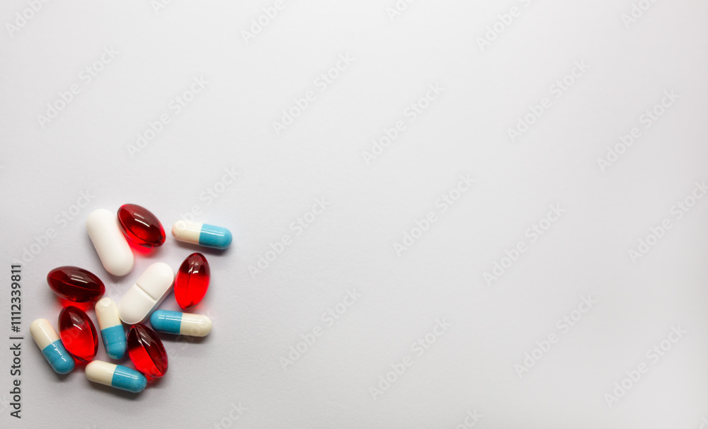 many scattered Colorful pills on white background many scattered Colorful pills on white background