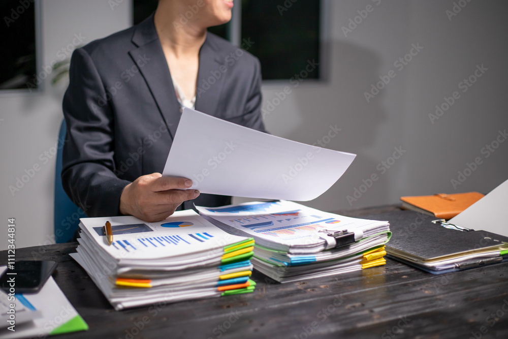 custom made wallpaper toronto digitalAccountants working on financial investments on calculators, calculating, analyzing business and marketing growth on graphs of various financial documents.