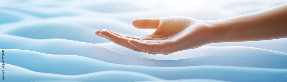 Hand reaching out symbolizing tranquility and connection with soft, flowing textures around. Hand reaching out symbolizing tranquility and connection with soft, flowing textures around.