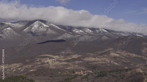 A breathtaking scenic mountain landscape featuring stunningly beautiful snowcapped peaks