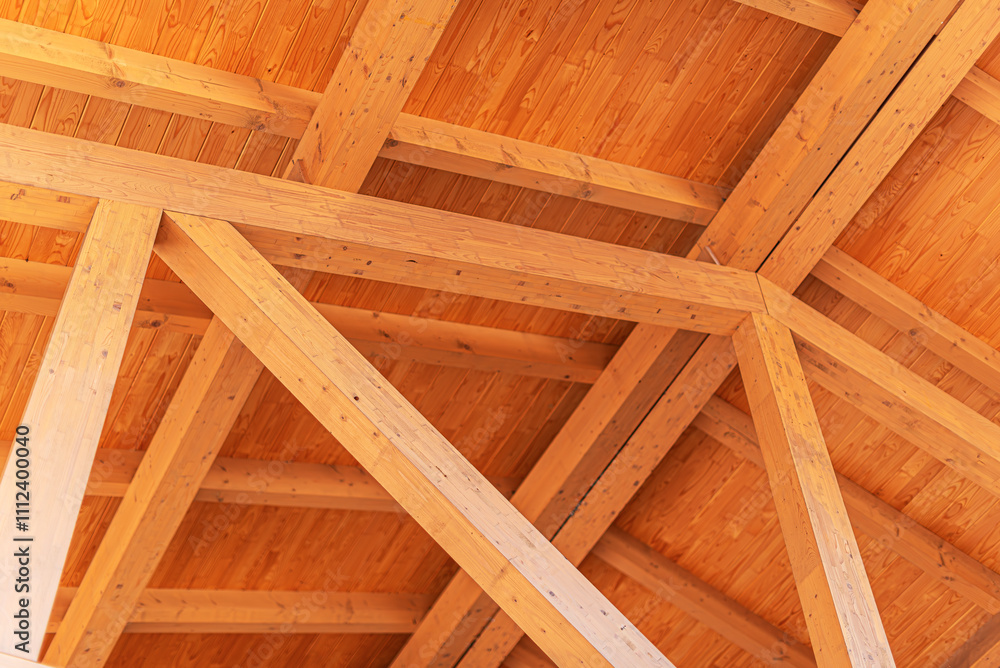 Construction of a wooden roof of a frame house.