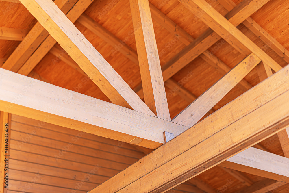 Construction of a wooden roof of a frame house.