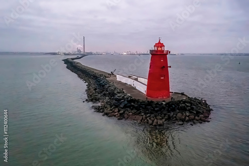 Aerial photography of Poolbeg lighthouse and the Great South Wall early in the morning photo