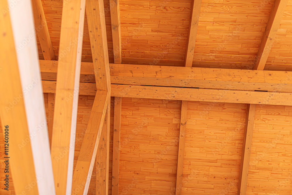Construction of a wooden roof of a frame house.