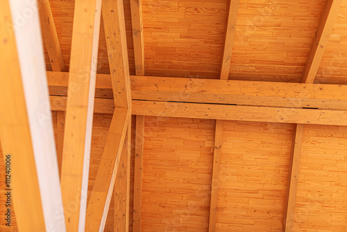 Obraz na płótnie Construction of a wooden roof of a frame house. w salonie