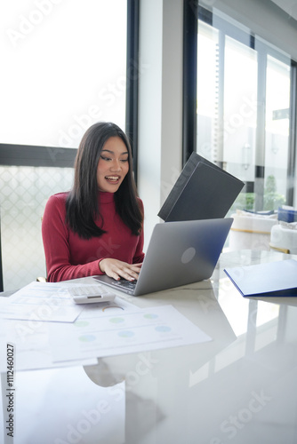 Beautiful Business Woman working by using laptop computer Hands typing on keyboard. Professional investor working new start up project. business planning in office. Technology business Concept.