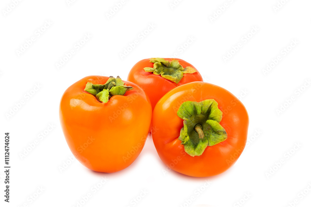 Persimmon isolated on white background. Persimmon fruit. Slice of ripe, juicy, sweet persimmon fruit. Vegan. Fruit garden. Close-up. Persimmon isolated on white background. Persimmon fruit. Slice of ripe, juicy, sweet persimmon fruit. Vegan. Fruit garden. Close-up.