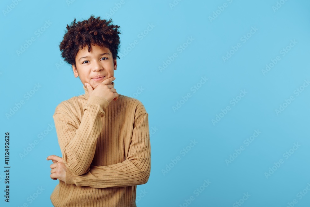 Reflective young african american woman poses thoughtfully with hand on chin, capturing a moment of inner contemplation Reflective young african american woman poses thoughtfully with hand on chin, capturing a moment of inner contemplation