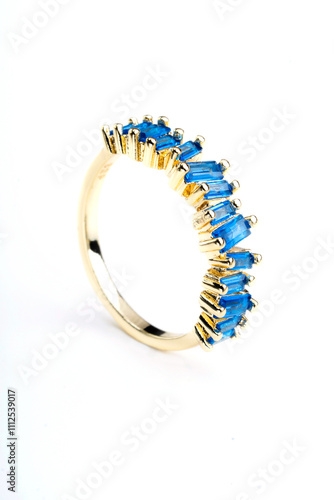 golden ring with translucent blue stones