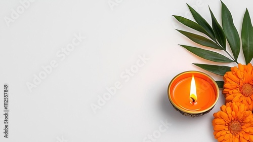 A photostock of a traditional brass diya lamp glowing with a soft flame, surrounded by marigold flowers on a white background. High Quality photo