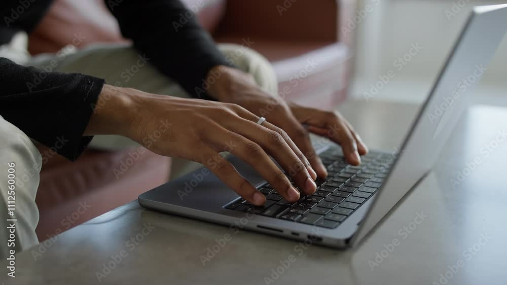 Close-Up of Hands Typing on a Laptop in a Relaxed Setting Close-Up of Hands Typing on a Laptop in a Relaxed Setting
