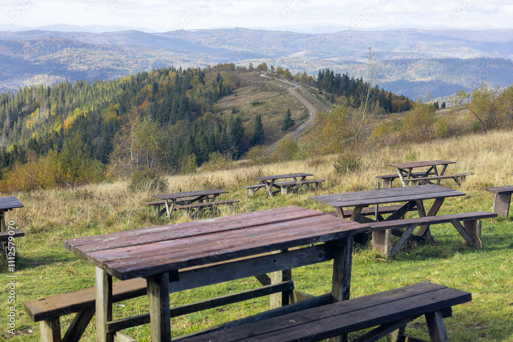 Wooden tables in the mountains Wooden tables in the mountains