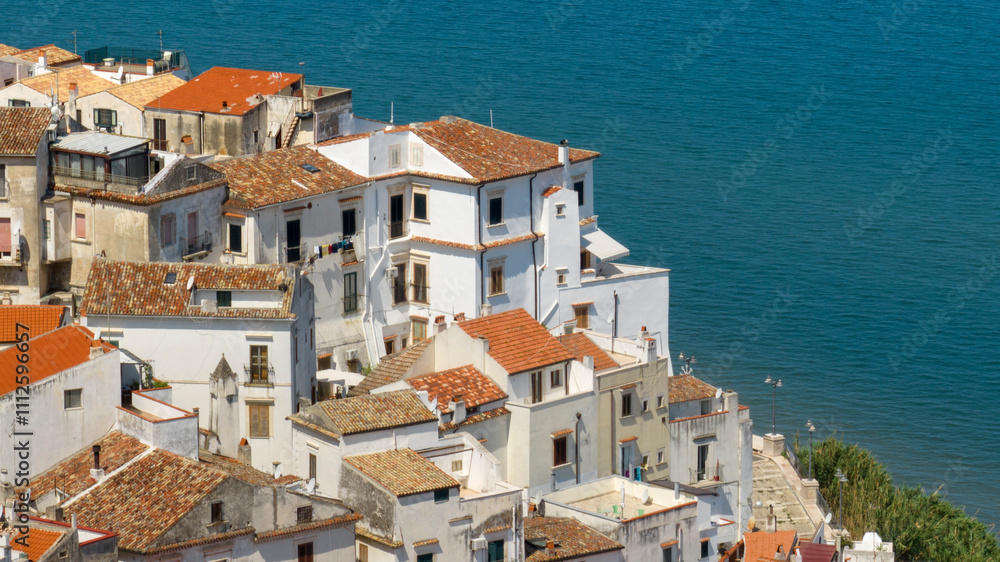 Aerial view of houses in the historic center of Rodi Garganico, located in Gargano, Puglia, Italy. The apartments overlook the Adriatic Sea.