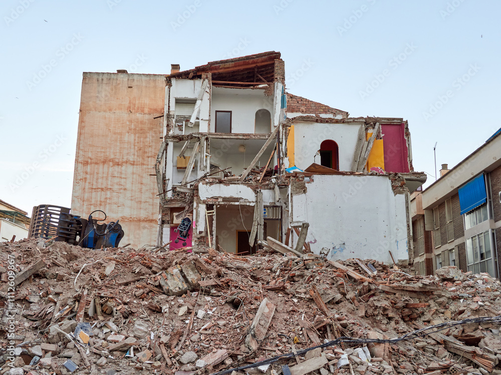 Collapsed buildings and houses. Natural disasters such as earthquakes or floods can cause structural failure, partially or entirely, of a building, threatening human life and health..
