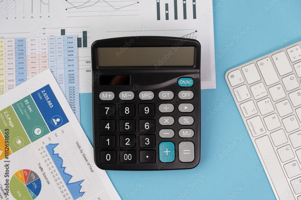 business background, graphics calculator and laptop business background, graphics calculator and laptop