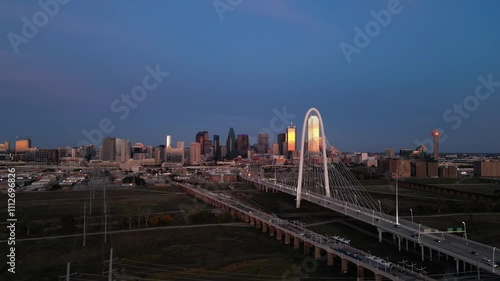 A bird's-eye drone aerial view of Dallas downtown, showcasing its iconic skyline and bustling streets.