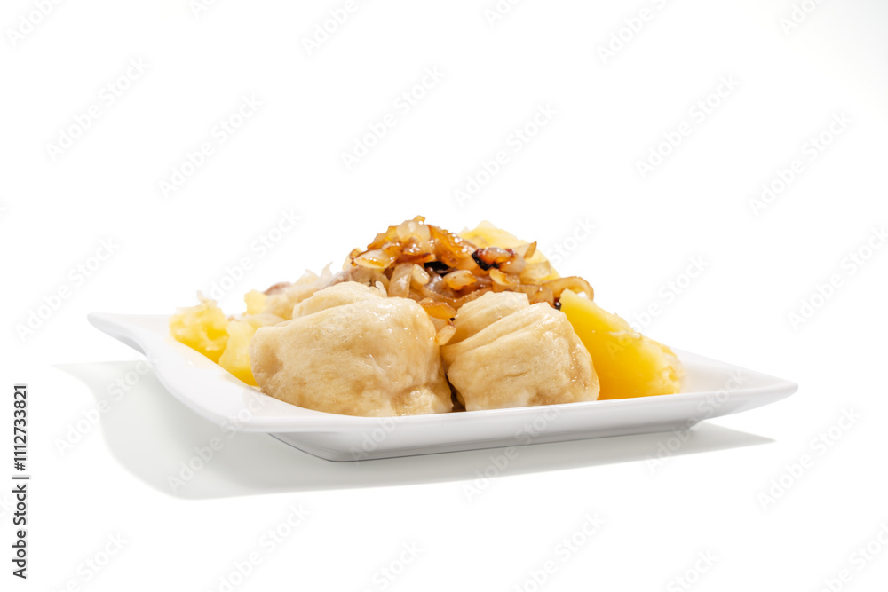 A plate of food with a white background. The food is a mix of potato and meat A plate of food with a white background. The food is a mix of potato and meat