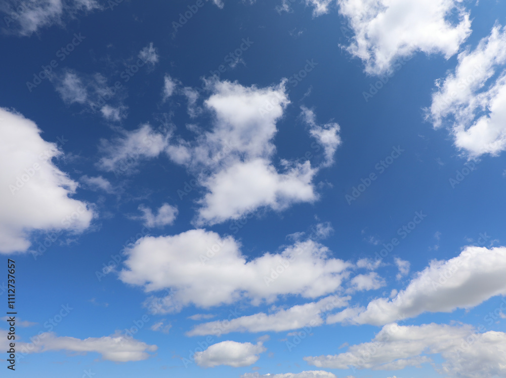 background of blue sky and white clouds ideal as a concept of pure breathable and natural air background of blue sky and white clouds ideal as a concept of pure breathable and natural air