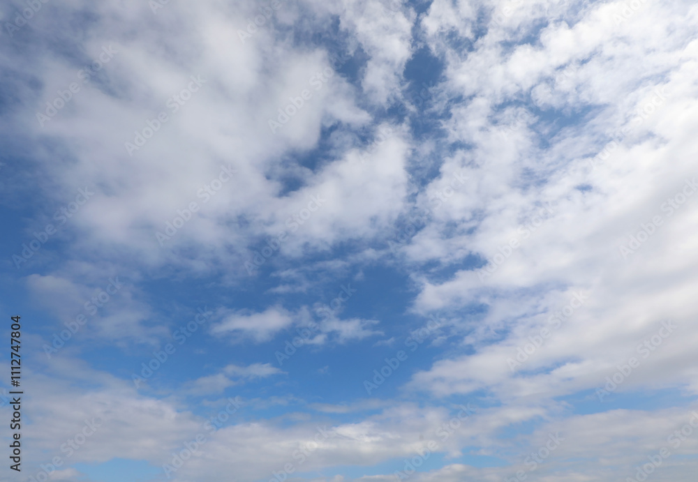blue sky with white clouds and no other elements ideal as a weather forecast concept blue sky with white clouds and no other elements ideal as a weather forecast concept