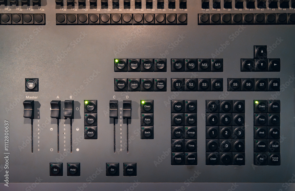 Control panel with buttons and faders for professional audio experience Control panel with buttons and faders for professional audio experience