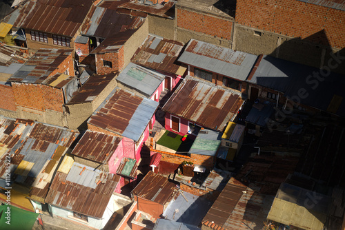 Aerial view of rustic rooftops in a Latin American neighborhood photo