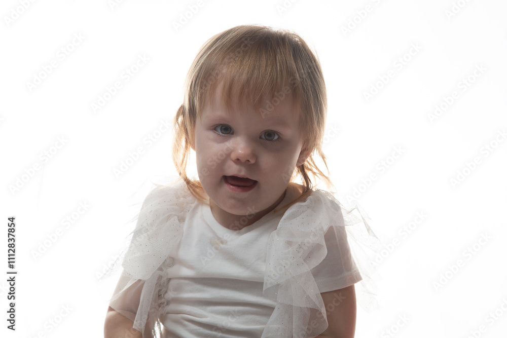 Portrait of a little girl on a white background. Portrait of a little girl on a white background.