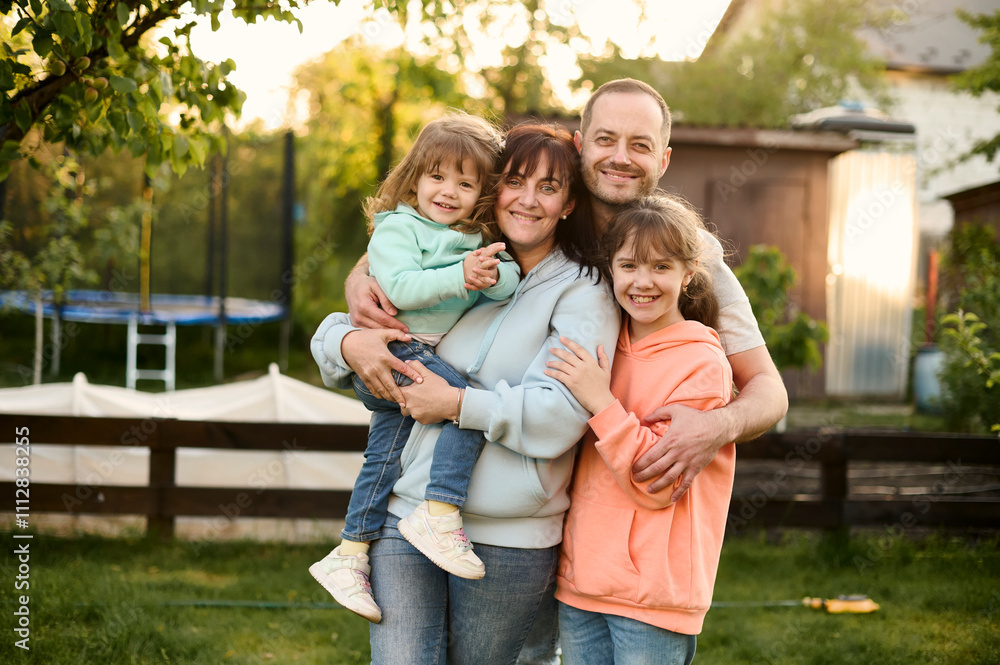 family portrait on a backyard family portrait on a backyard