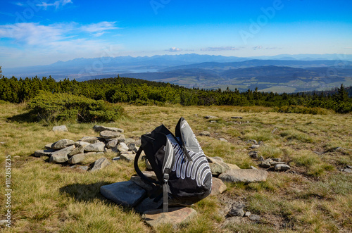 backpack on the top of Pilsko in the Beskid Żywiecki Mountains photo