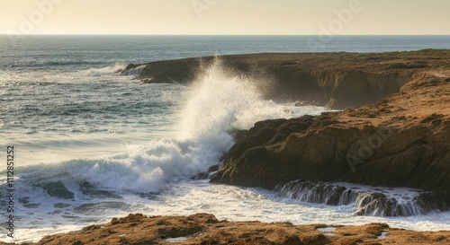 Serene coastal landscape with waves crashing on rocky shore