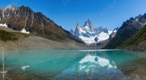 Serene mountain lake panorama with clear blue skies