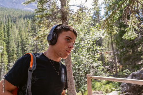 Headphones by forest path photo